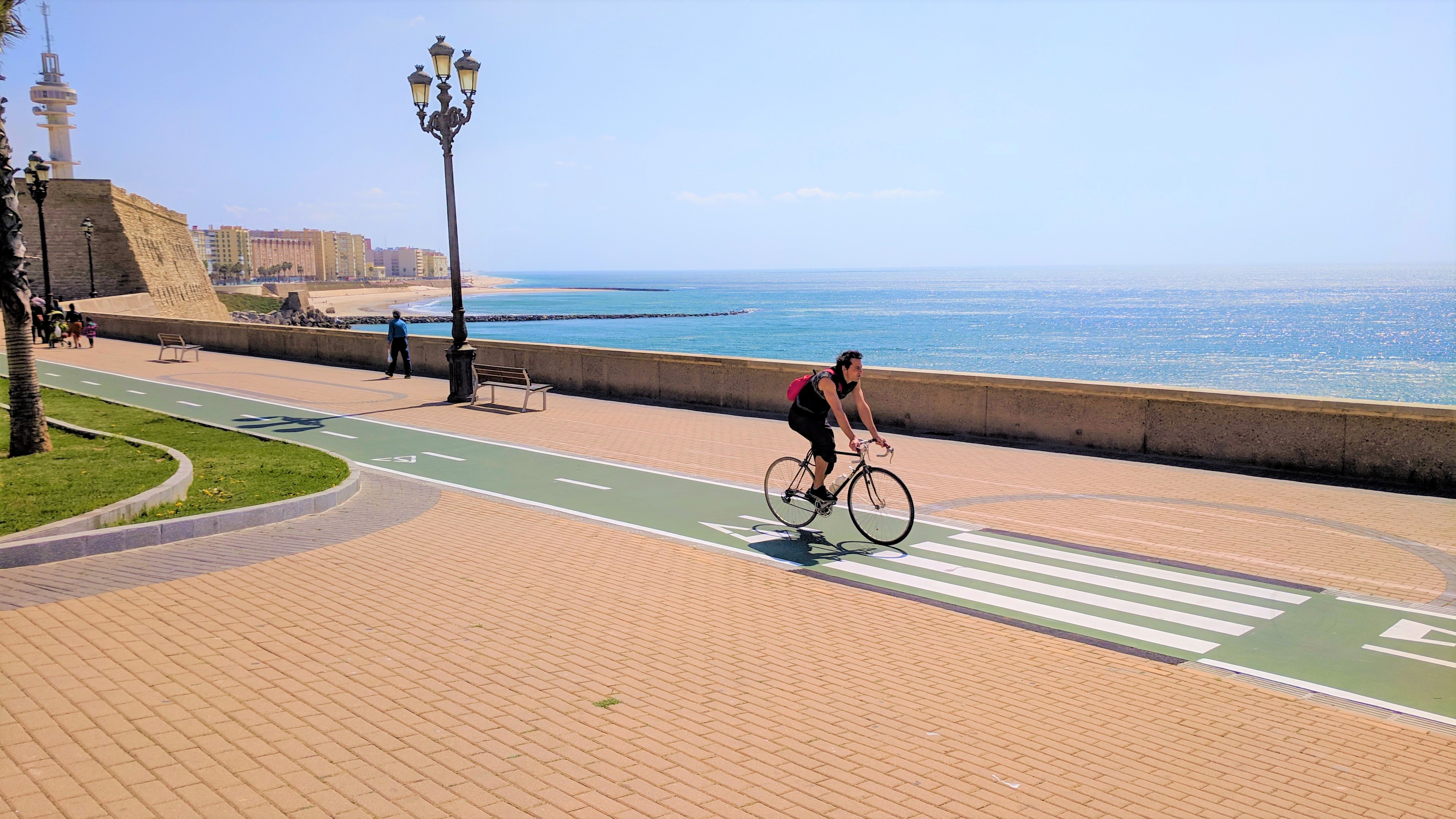 Cycling along coast in Cadiz Cycling along coast in Cadiz