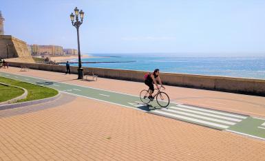 Cycling along coast in Cadiz Cycling along coast in Cadiz